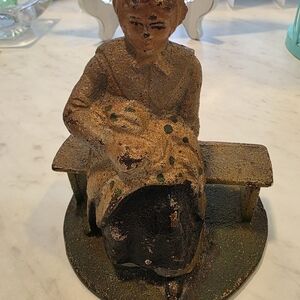 Rustic Cast Iron Figurine of a Seated Woman with Child. Amish
